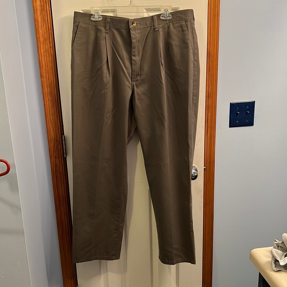 Men’s Rustler khakis brown with minor discoloration on leg 38x30